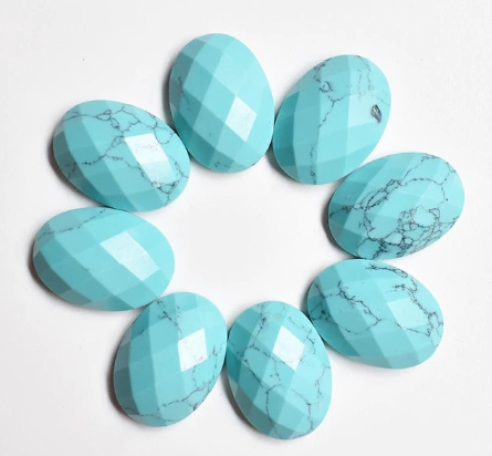 Stone Cab - Faceted Turquoise Howlite Ovals - 13 x 18 mm