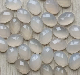 Stone Cab - Faceted White Onyx Ovals - 13 x 18 mm
